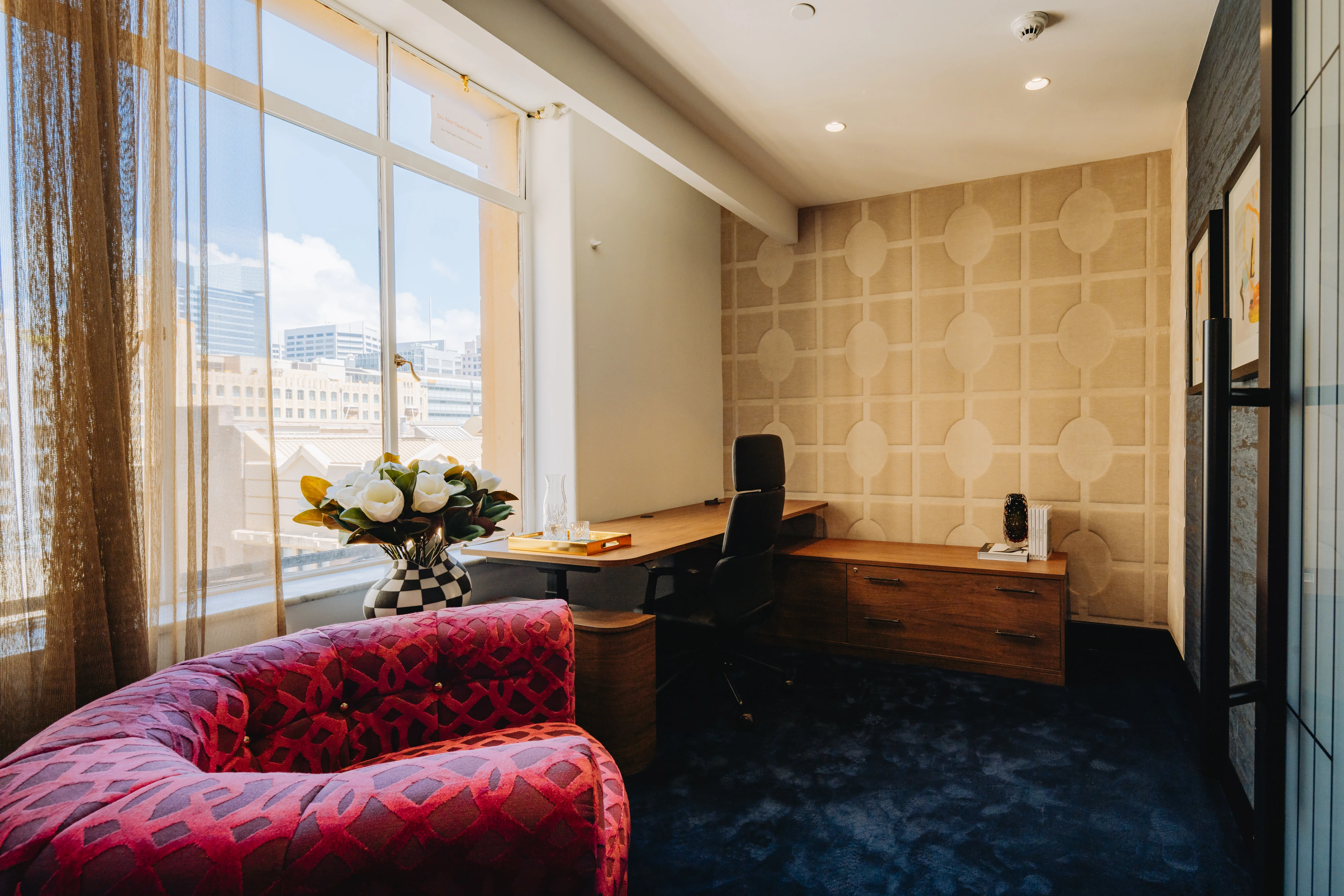 Custom timber joinery set against Barrack House’s historic mouldings and original casement windows
