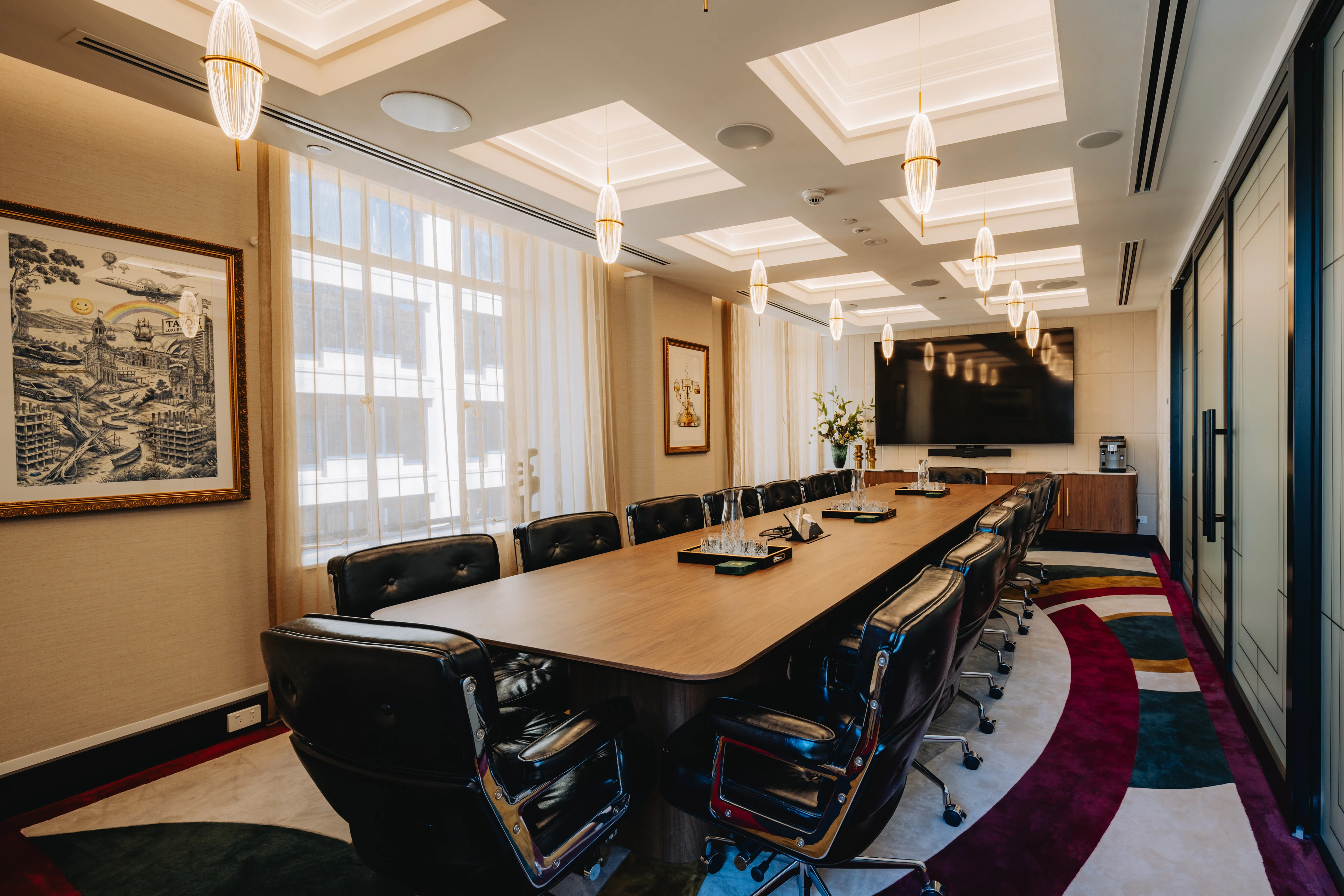Executive boardroom table on fluted timber bases in a Tajon meeting room