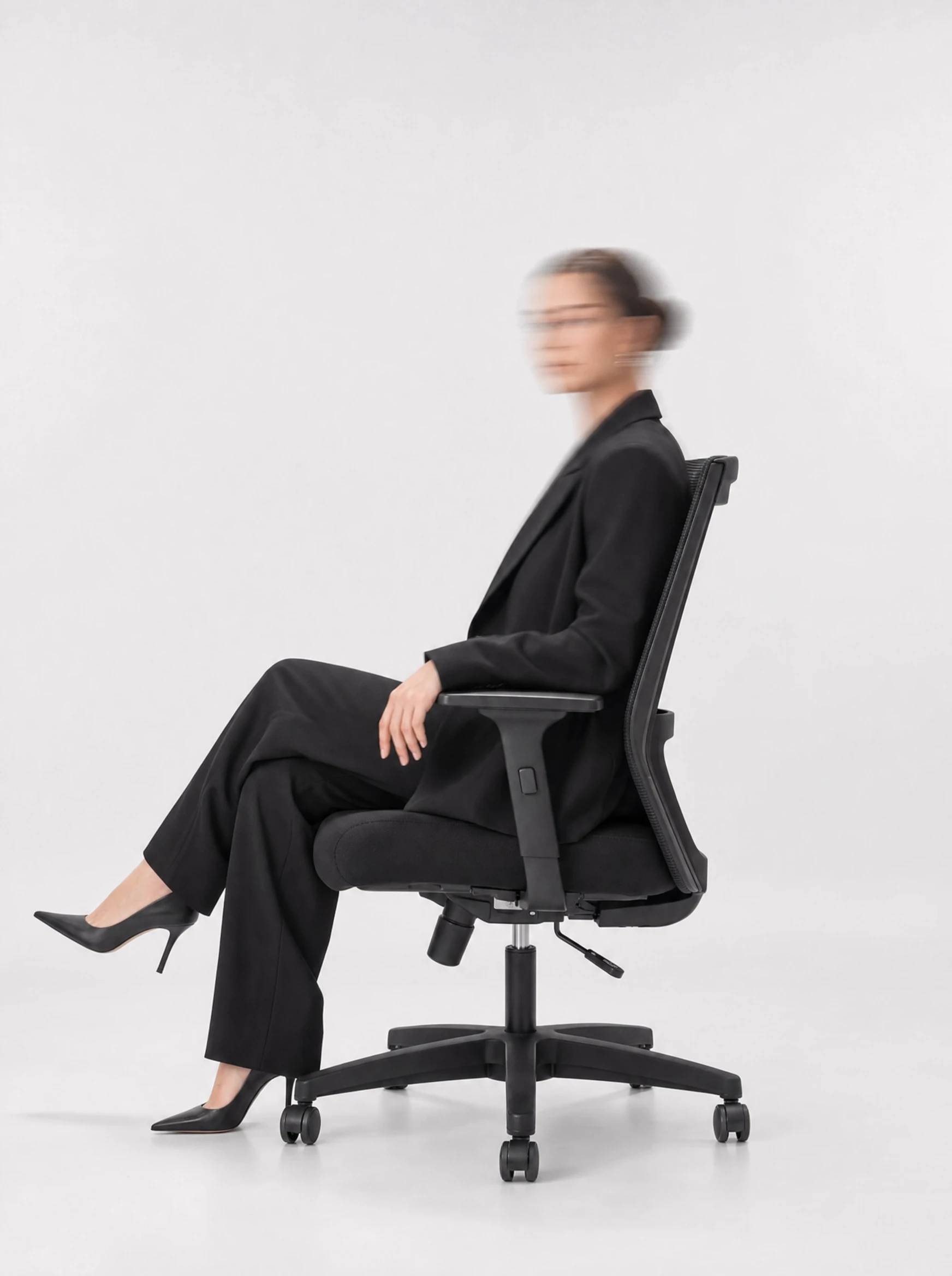 Dozens of Sonic chairs in a training room or contact-centre floor, repetition from a low wide angle, working…